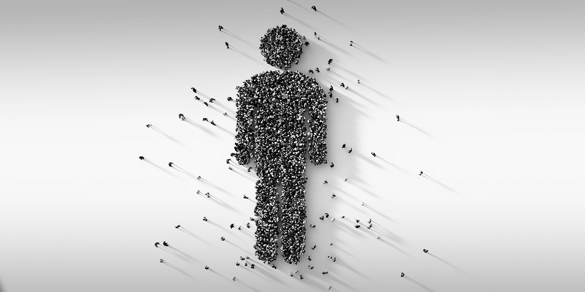 A stick figure made up of many people seen from far above